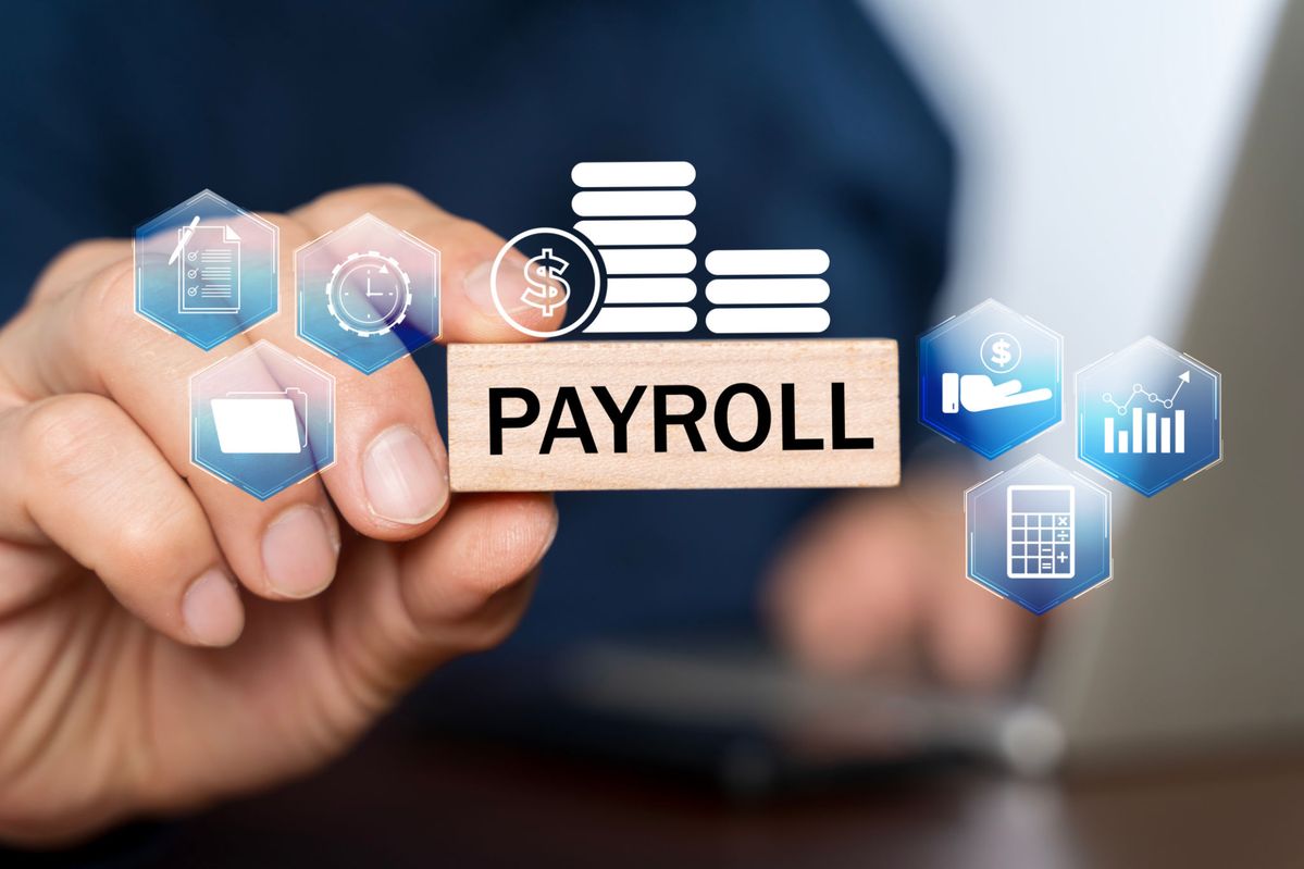 Payroll icons around a wooden block reading PAYROLL